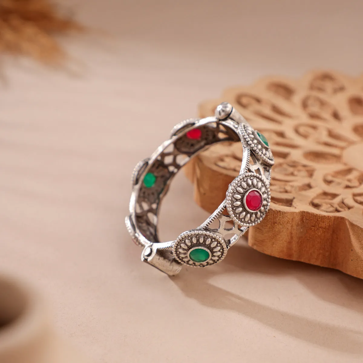 Gemstone-embellished circular bracelet