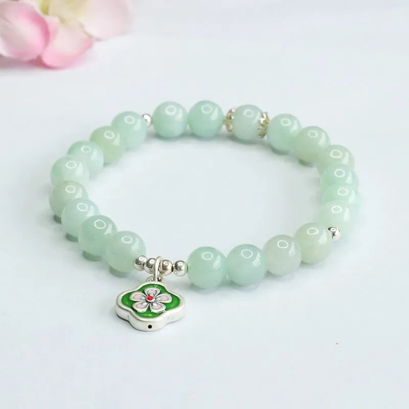 Jade Bracelet with Sterling Silver Four Leaf Flower Detail