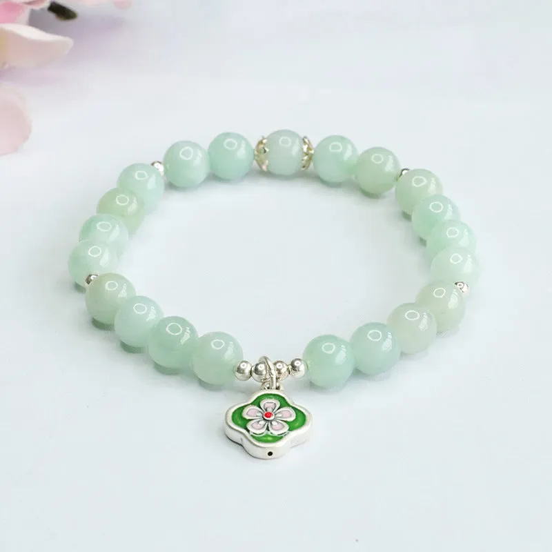 Jade Bracelet with Sterling Silver Four Leaf Flower Detail