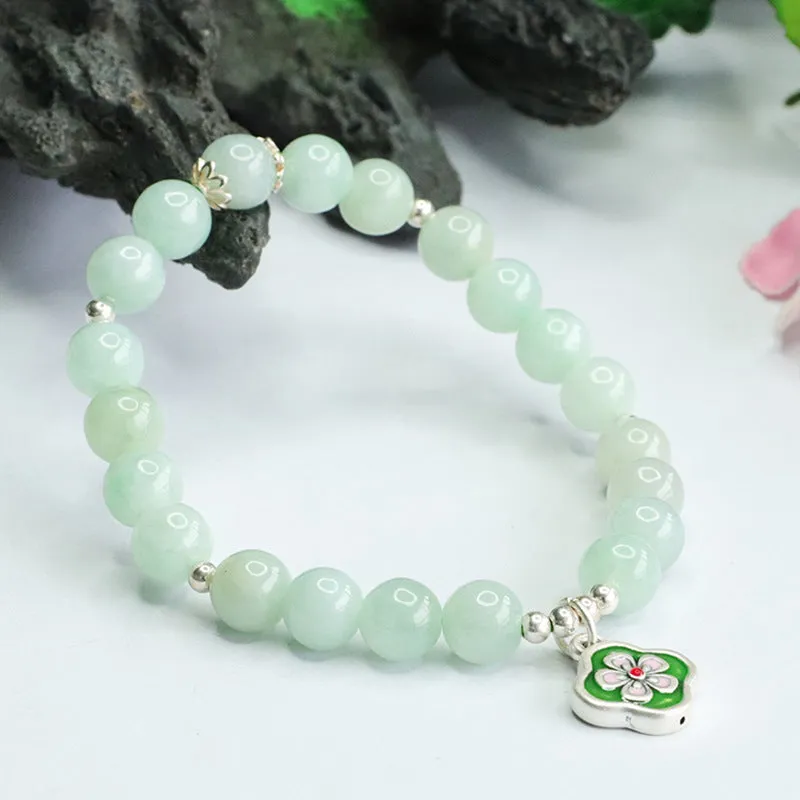 Jade Bracelet with Sterling Silver Four Leaf Flower Detail