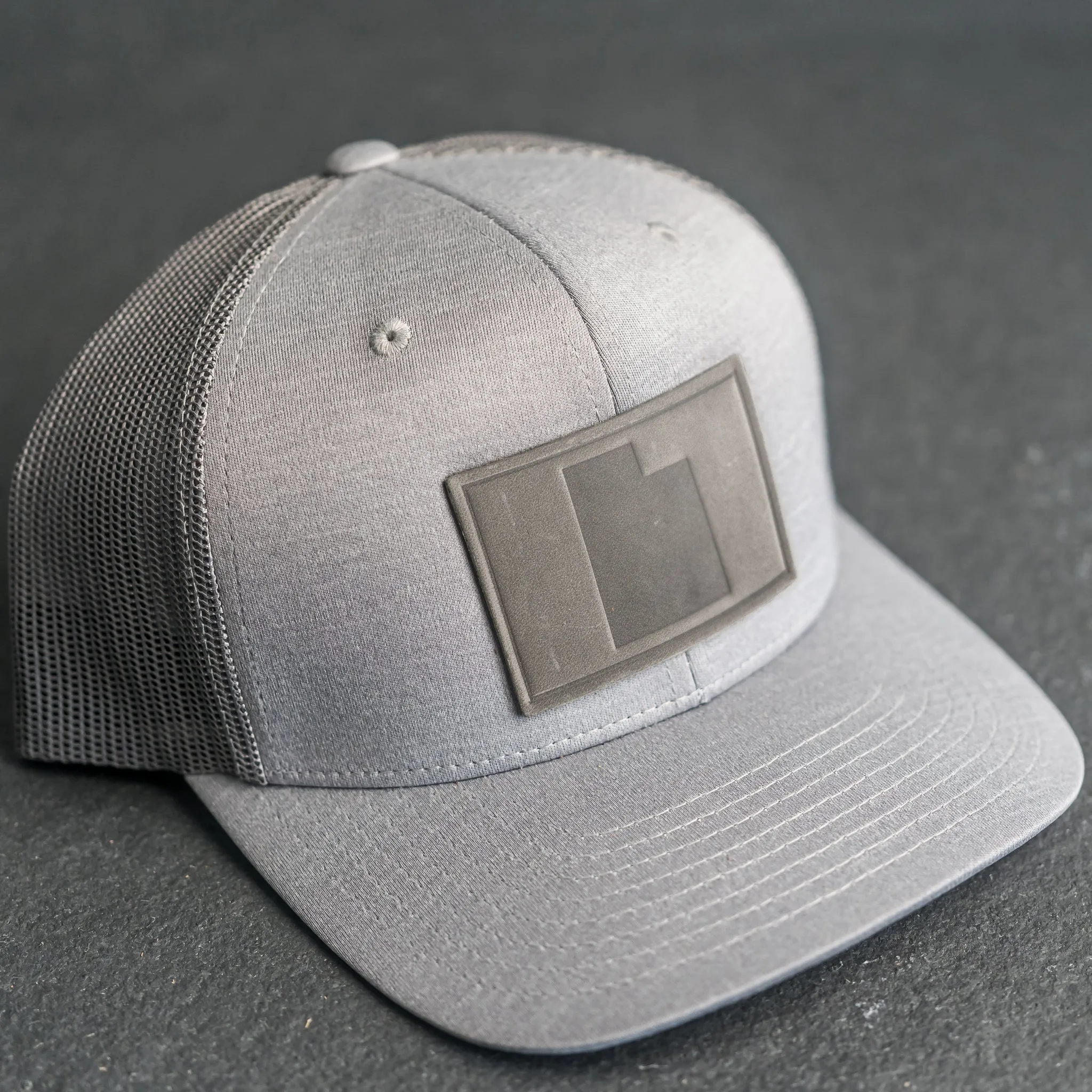 Leather Patch Performance Style Trucker Hat - Utah Stamp