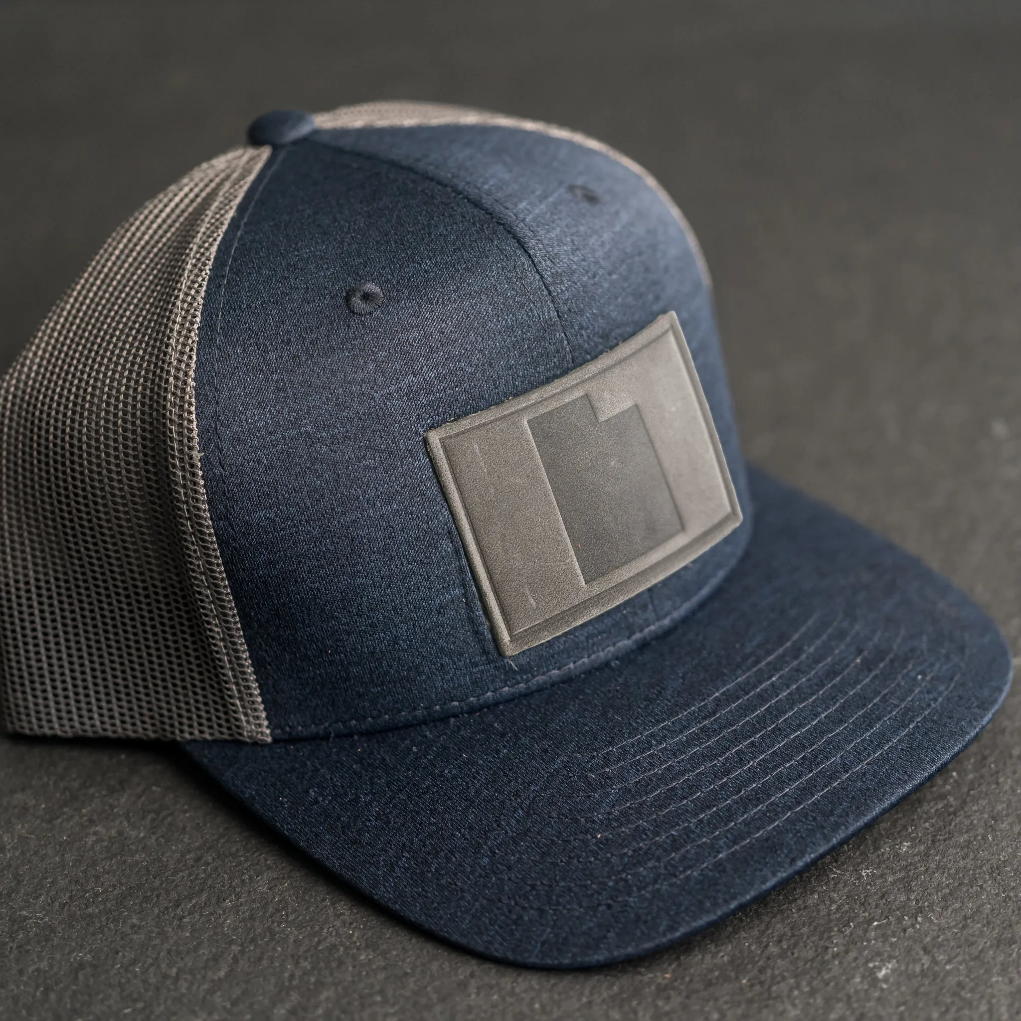 Leather Patch Performance Style Trucker Hat - Utah Stamp