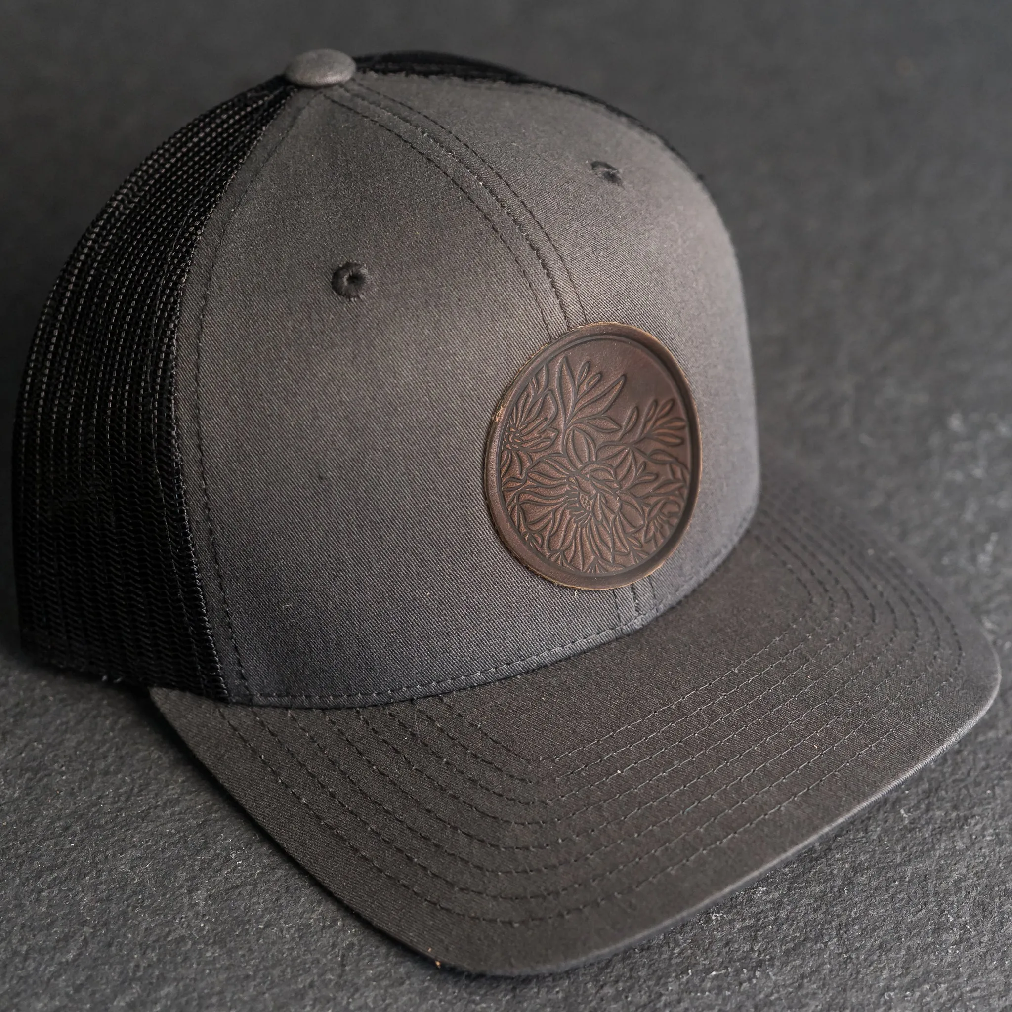 Leather Patch Trucker Style Hat - Circle Patch - Floral Stamp