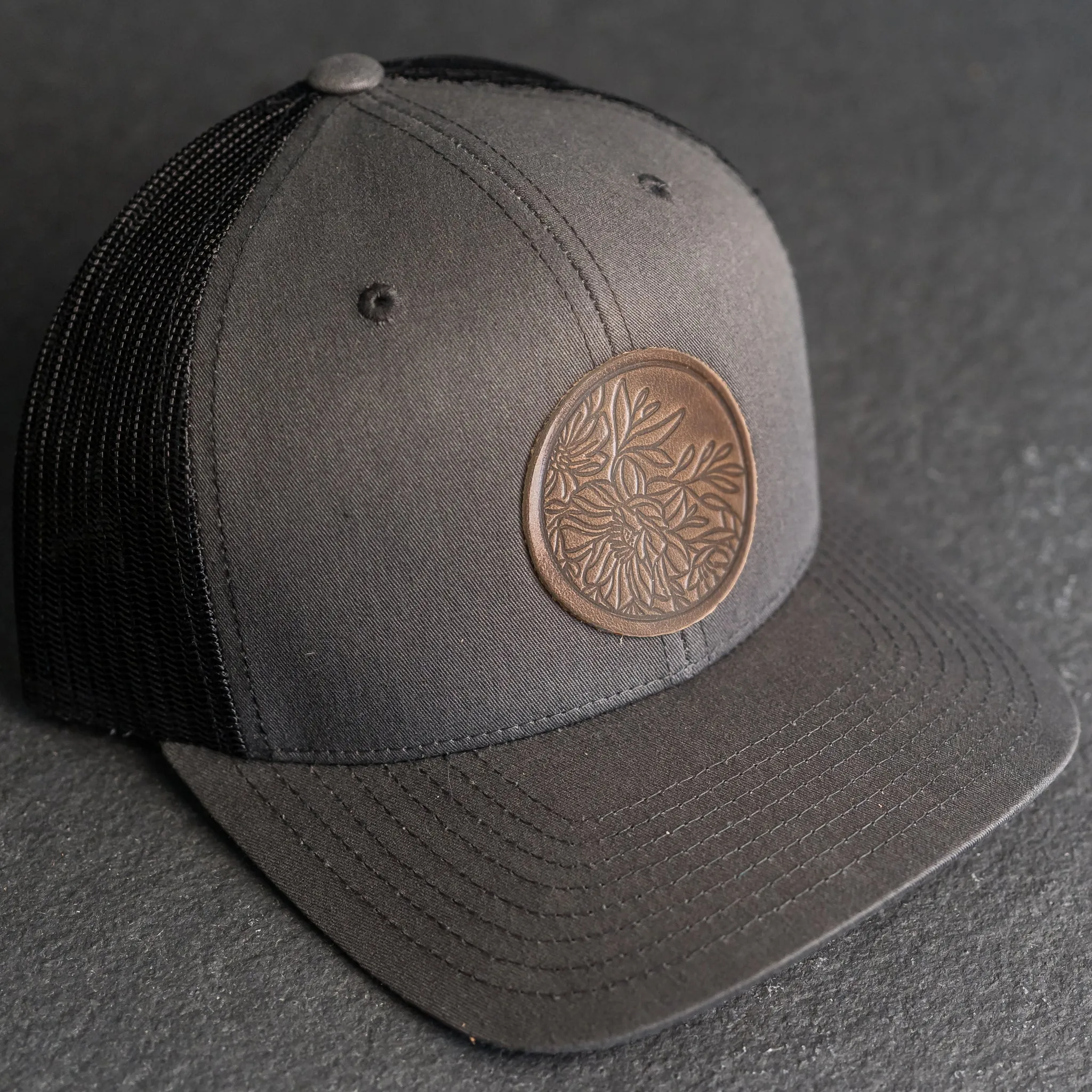 Leather Patch Trucker Style Hat - Circle Patch - Floral Stamp