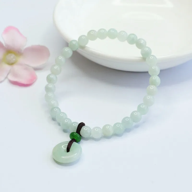 Light Green Jade Bracelet with Sterling Silver Safety Buckle and Tassel Detail