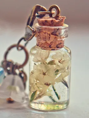 Real yellow dried flowers in resin vial necklace