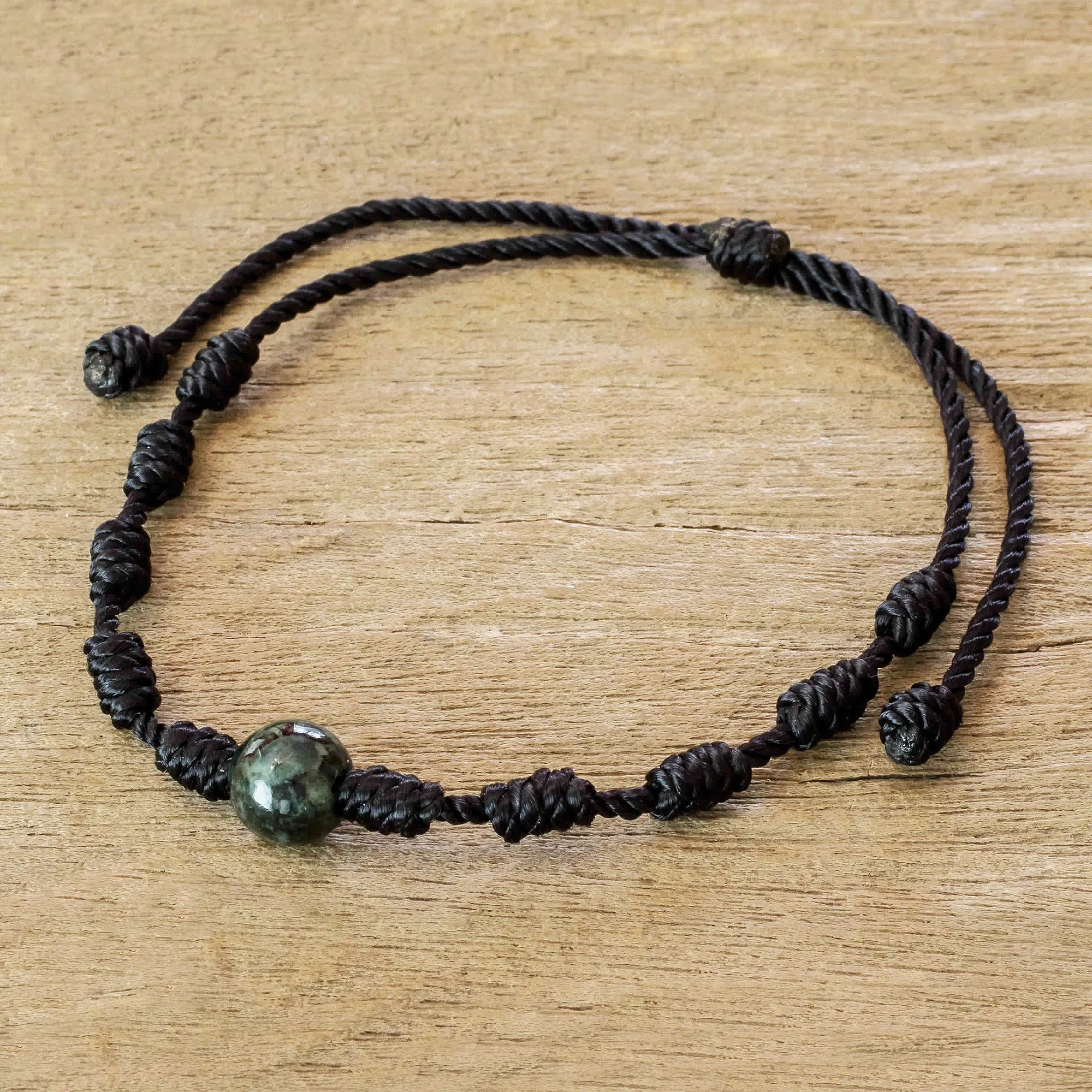 Unisex Black Cord and Green Jade Bracelet - Knotty | NOVICA